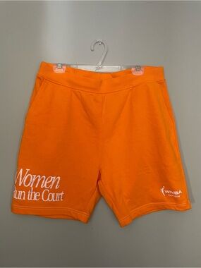 Peace Collective WNBA Women run the court orange shorts
